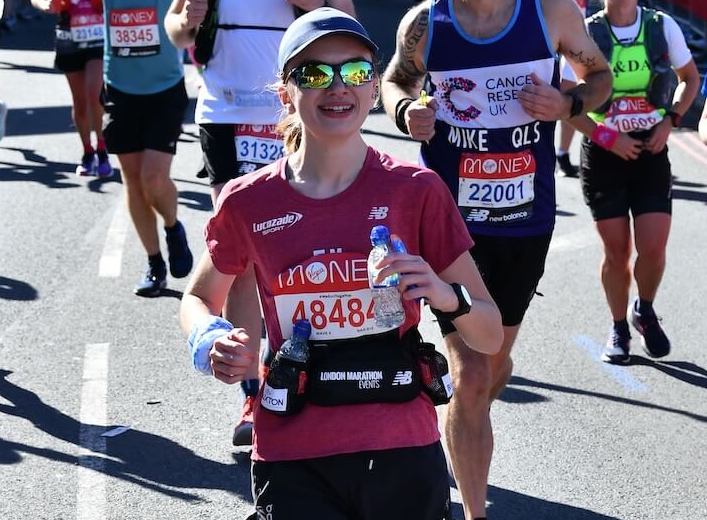 A picture of Emily running over Tower Bridge during the London Marathon